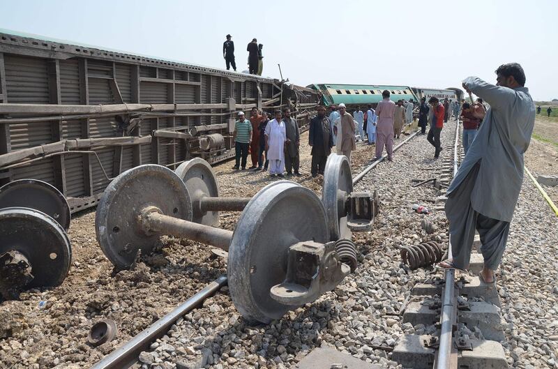 (FILES) In this file photo taken on March 17, 2019 Pakistani passengers and villagers gather after a remote-controlled bomb exploded on a railway line in Nasirabad in the province of Balochistan, some 311 km southeast of Quetta. The United States on July 2, 2019 designated militants fighting Pakistani rule in Balochistan as terrorists after it carried out deadly attacks targeting Chinese interests. The State Department said it was classifying the Balochistan Liberation Army as a global terrorist group, making it a crime for anyone in the United States to assist the militants and freezing any US assets they may have.
 / AFP / FIDA HUSSAIN
