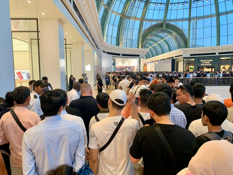 People queue for the iPhone 15 at Mall of the Emirates in Dubai. Pawan Singh / The National