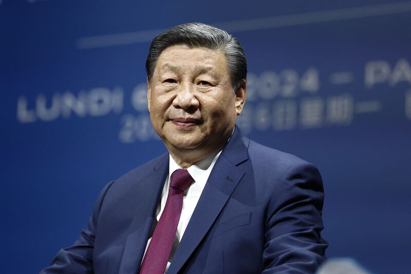 Mr Xi attends the sixth meeting of the Franco-Chinese Business Council at the Marigny Theatre in Paris on Monday. AFP