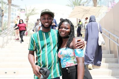 Bismarck Amartey Narh and Helen Awahnji from Ghana enjoy the atmosphere on the final day. Pawan Singh / The National