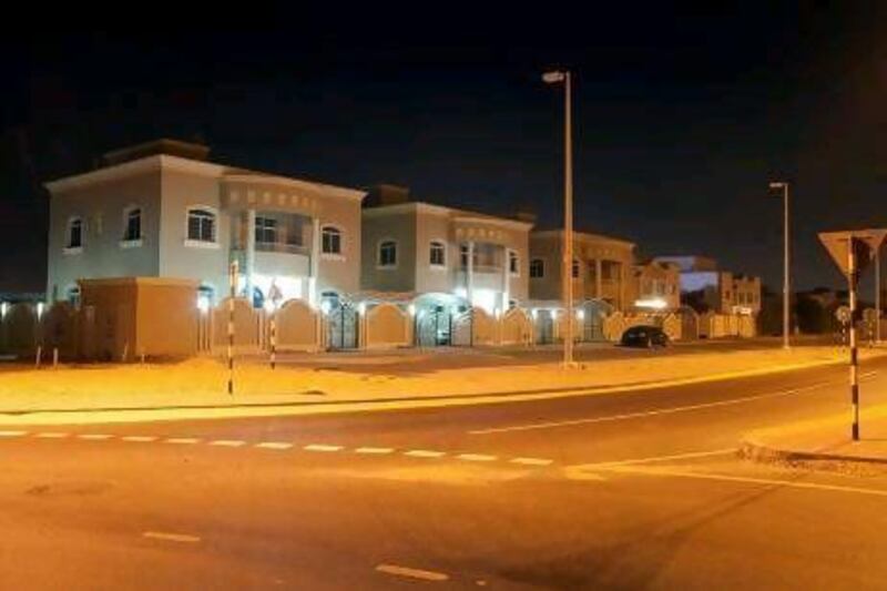 New villas stretch along wide open roads in Khalifa City B, A. New villas should be registered with the municipality's Tawtheeq.