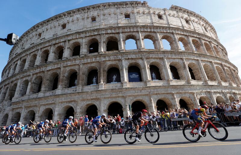 The Giro d'Italia peloton passes the Colosseum during stage 21. Reuters