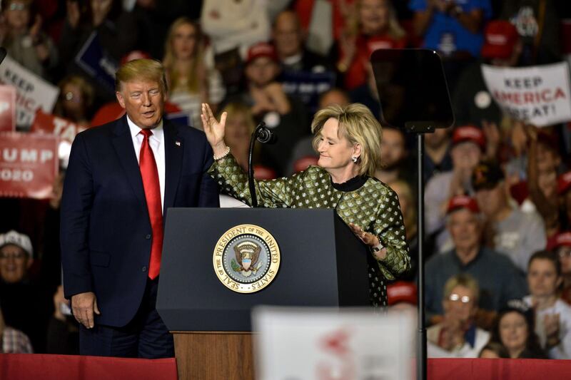 U.S. Senator Cindy Hyde-Smith (R-MS) speaks alongside President Donald Trump during a "Keep America Great" campaign rally at BancorpSouth Arena in Tupelo, Mississippi. Trump is campaigning in Mississippi ahead of a state gubernatorial election where Republican Tate Reeves is in a close race with Democrat Jim Hood. AFP
