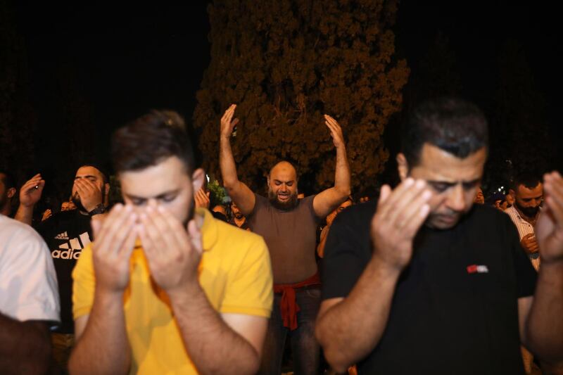 Palestinians supplicate as they seek Laylat Al Qadr, or the Night of Destiny, in the Al Aqsa Mosque compound, in Jerusalem's Old City. AP Photo