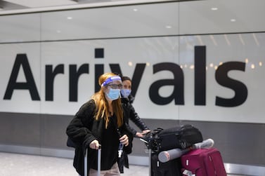 Travellers arrive at London Heathrow Airport in London, UK. Bloomberg