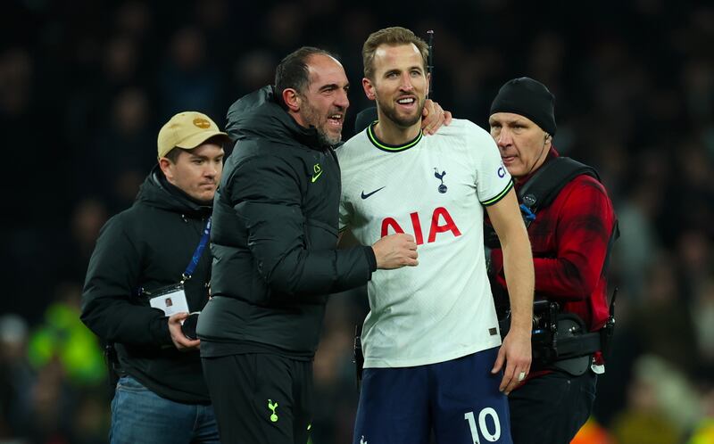 Tottenham assistant manager Cristian Stellini greets Harry Kane after the match against Manchester City. EPA