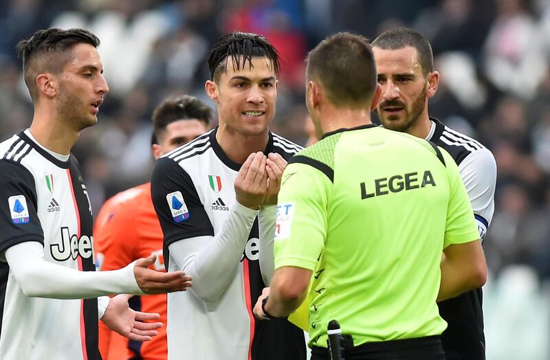 Juventus' Cristiano Ronaldo remonstrates with referee Fabrizio Pasqua. Reuters
