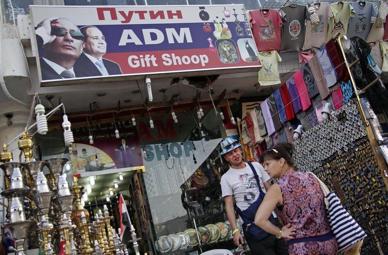 Russian tourists shop in the Old Market in the Red Sea resort town of Sharm El Sheikh, south Sinai, Egypt as thousands of tourists fly out of the Red Sea resort on November 9, 2015 after the crash of a Russian plane last week that killed all 224 passengers on board. Ahmed Abd el-Latif/AP Photo