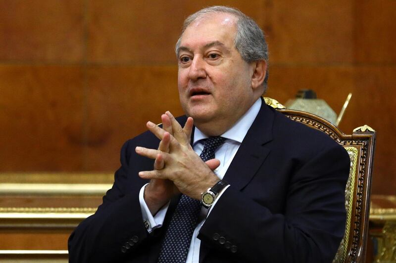 This handout photograph taken and released on November 21, 2020 by the Russian Foreign Ministry shows Armenian President Armen Sarkissian speaking with the Russian Foreign Minister during their meeting in Yerevan. (Photo by Handout / RUSSIAN FOREIGN MINISTRY / AFP) / RESTRICTED TO EDITORIAL USE - MANDATORY CREDIT "AFP PHOTO / Russian Foreign Ministry / - " - NO MARKETING - NO ADVERTISING CAMPAIGNS - DISTRIBUTED AS A SERVICE TO CLIENTS
