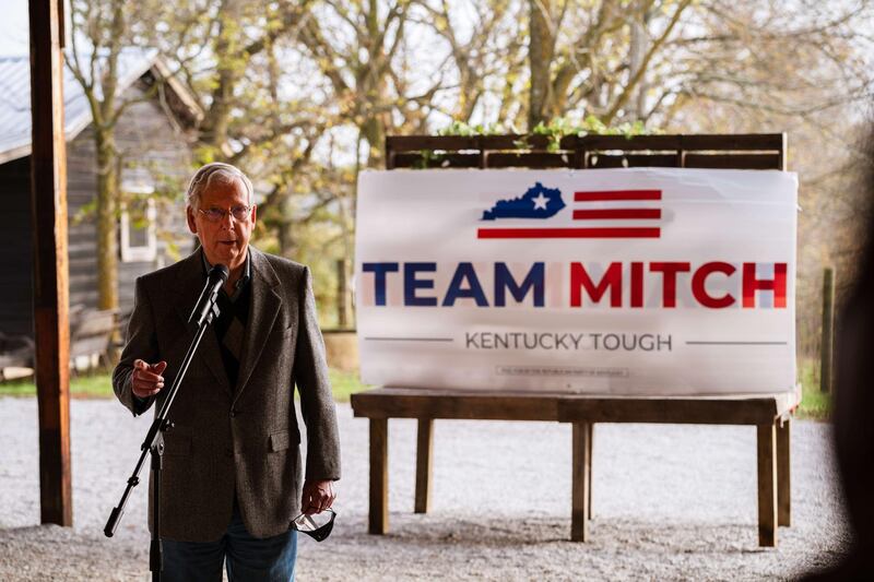 Senate Majority Leader Sen. Mitch McConnell stands and speaks to the press and his supporters during a campaign stop in Smithfield, Kentucky.  AFP