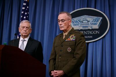 Defense Secretary Jim Mattis, joined by Joint Chiefs Chairman Gen. Joseph Dunford, speak at the Pentagon, Friday, April 13, 2018, on the U.S. military response, along with France and Britain, to Syria's chemical weapon attack on April 7.â€‹ (AP Photo/Carolyn Kaster)