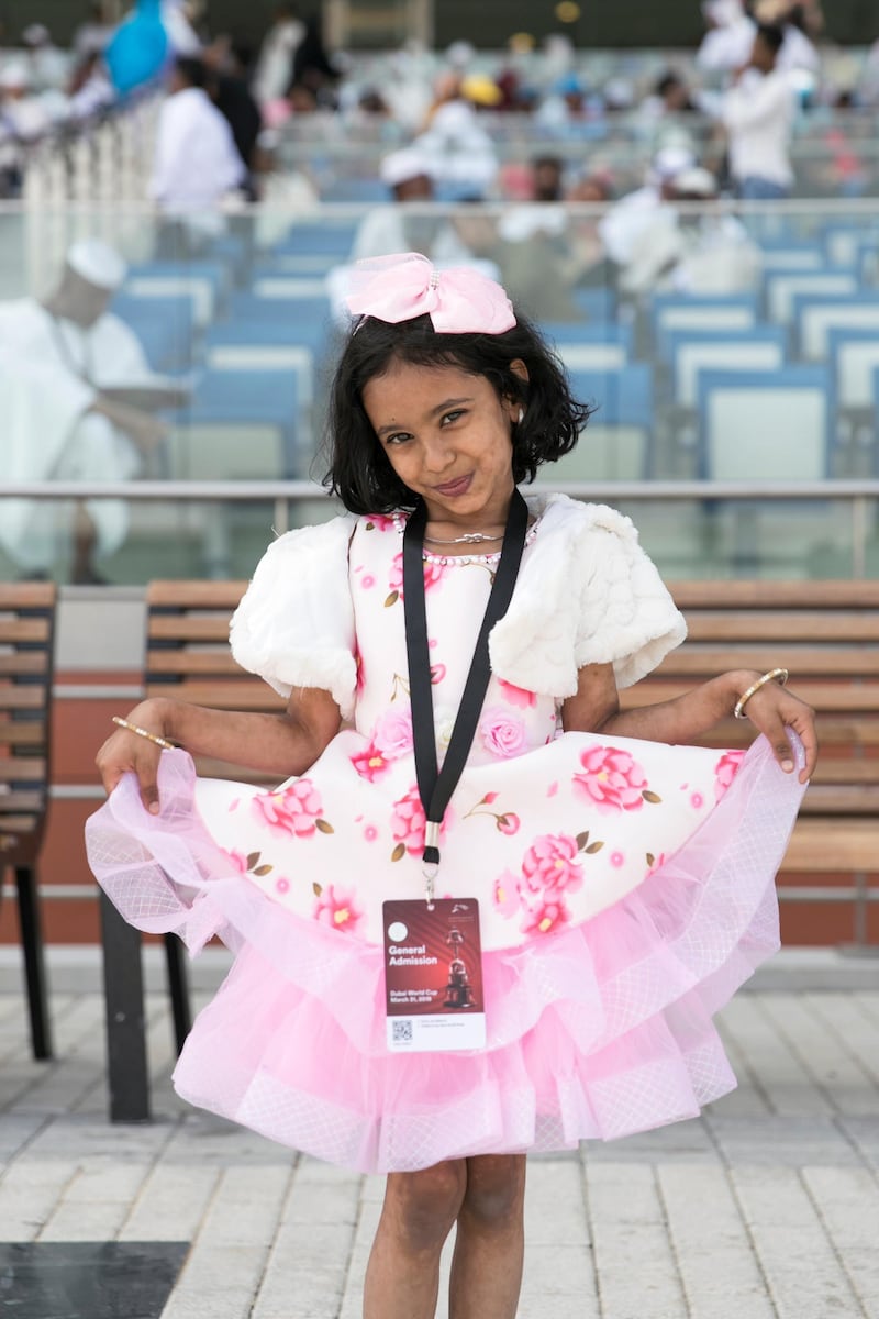 DUBAI, UNITED ARAB EMIRATES - MARCH 31, 2018. 

A little girl dressed in pink at Dubai World Cup 2018.

(Photo by Reem Mohammed/The National)

Reporter: 
Section: NA