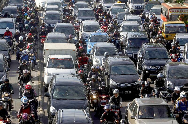 Vehicles are seen stuck in a traffic jam during rush hour in Jakarta. REUTERS / Supri