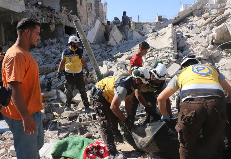 Syrian White Helmets  search for victims from under the rubble. AP