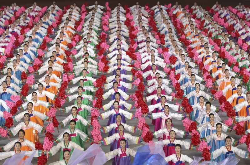 A sea of performers filled the stadium during the performance. Getty Images