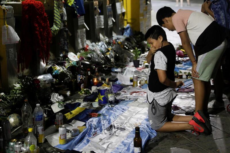 People mourn  outside the Alberto J. Armando "La Bombonera" stadium in Buenos Aires. Reuters