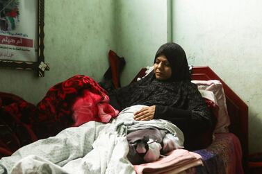 Malina Al Hindi lies in her bed in Khan Younis, Gaza, after being wounded by an Israeli sniper an in the Great March of Return protests. Wilson Fache for The National