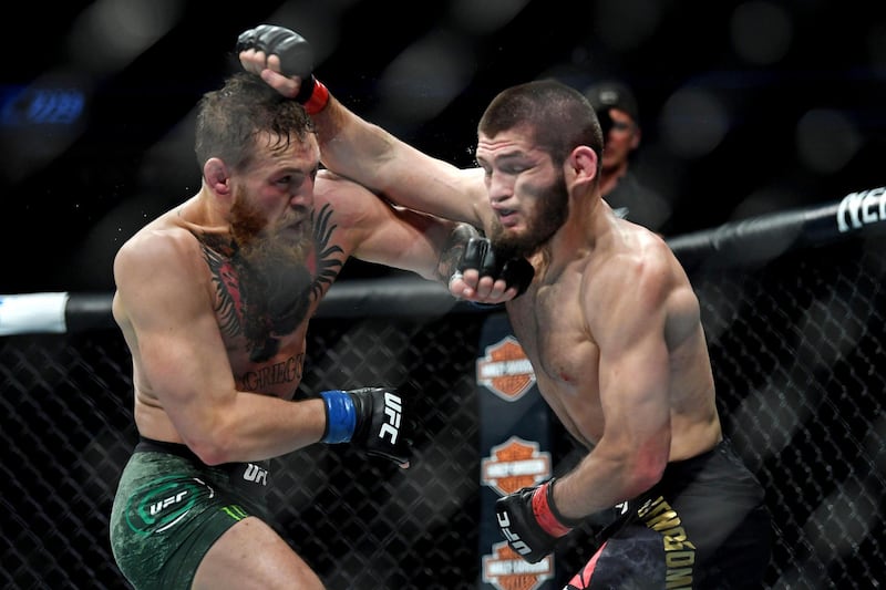 Oct 6, 2018; Las Vegas, NV, USA; Khabib Nurmagomedov (red gloves) fights Conor McGregor (blue gloves) during UFC 229 at T-Mobile Arena. Mandatory Credit: Stephen R. Sylvanie-USA TODAY Sports