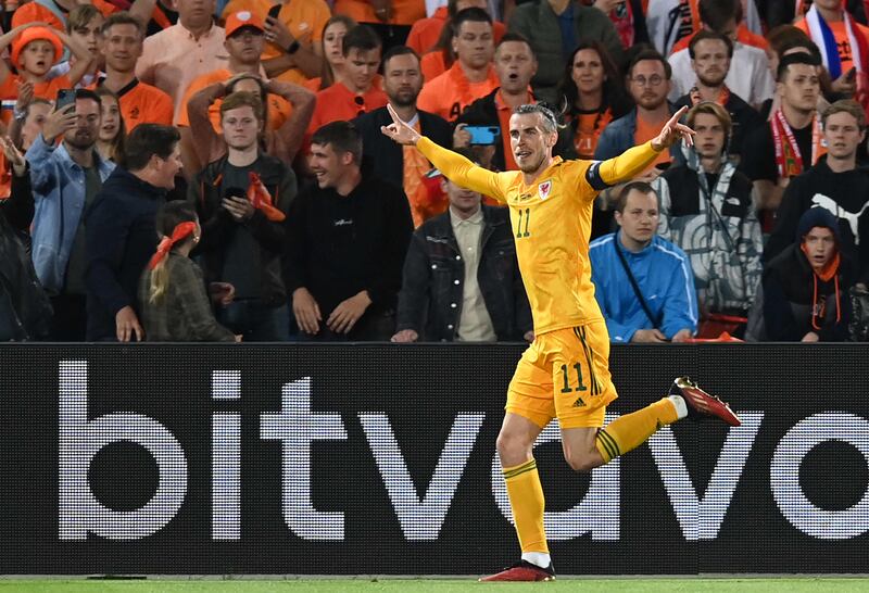 Wales' striker Gareth Bale celebrates after levelling at 2-2. EPA