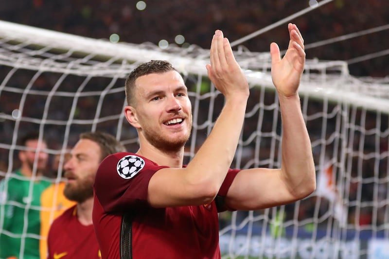 ROME, ITALY - APRIL 10: Edin Dzeko of AS Roma celebrates victory after the UEFA Champions League Quarter Final Second Leg match between AS Roma and FC Barcelona at Stadio Olimpico on April 10, 2018 in Rome, Italy.  (Photo by Catherine Ivill/Getty Images)