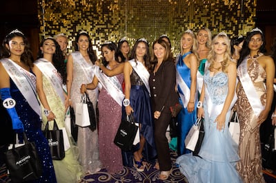 Miss England director Angie Beasley with finalist Melisa Raouf and other contestants at the Taj 51 Buckingham Gate in London. Photo: Kam Murali