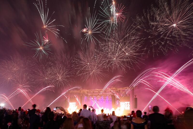 Fireworks go off at midnight at the New Year's Eve gala dinner at Atlantis, The Palm, Dubai. Chris Whiteoak / The National