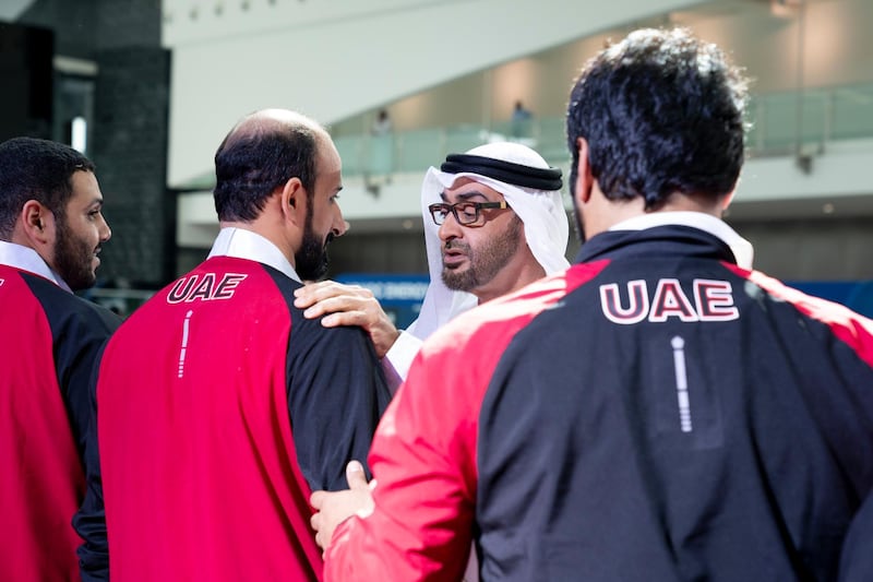 ABU DHABI, UNITED ARAB EMIRATES - March 20, 2019: HH Sheikh Mohamed bin Zayed Al Nahyan, Crown Prince of Abu Dhabi and Deputy Supreme Commander of the UAE Armed Forces (C) presents a medal to an athlete during the Special Olympics World Games Abu Dhabi 2019 at Abu Dhabi National Exhibition Centre.

( Mohamed Al Hammadi / Ministry of Presidential Affairs )
---