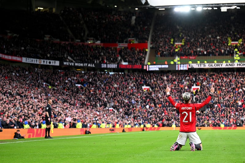 Antony celebrates in front of a wild Old Trafford. Getty Images