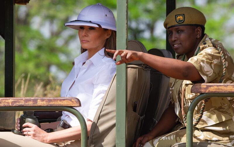 US First Lady Melania Trump goes on a safari with Nelly Palmeris (R), Park Manager, at the Nairobi National Park in Nairobi, October 5, 2018, during the third leg of her solo tour of Africa.  / AFP / SAUL LOEB
