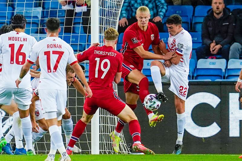 Norway forward Erling Haaland and Gibraltar midfielder Graeme Torrilla vie for the ball. AFP