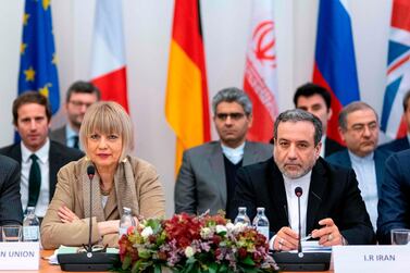 Abbas Araghchi and Helga Maria Schmid attend a meeting of the Joint Commission on Iran's nuclear program in Vienna on Friday. AFP