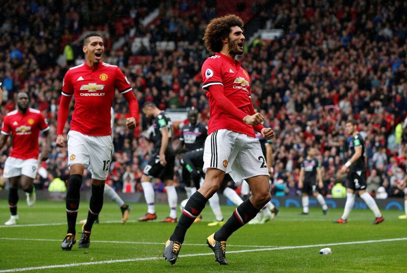 Soccer Football - Premier League - Manchester United vs Crystal Palace - Old Trafford, Manchester, Britain - September 30, 2017   Manchester United's Marouane Fellaini celebrates scoring their third goal   REUTERS/Andrew Yates  EDITORIAL USE ONLY. No use with unauthorized audio, video, data, fixture lists, club/league logos or "live" services. Online in-match use limited to 75 images, no video emulation. No use in betting, games or single club/league/player publications. Please contact your account representative for further details.