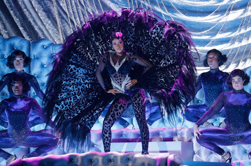 Cardi B dazzled in a peacock-inspired look, performing her new single, 'Money'. Reuters