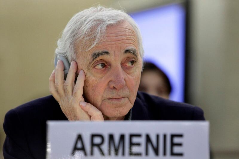 Armenia's ambassador to Switzerland, Armenian-French singer Charles Aznavour listens to a speech during a Human Rights Council at the European headquarters of the United Nations in Geneva, Switzerland, 27 January 2010 EPA