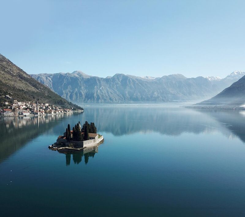 Our Lady of the Rock and city of Perast in Boka Kotorska