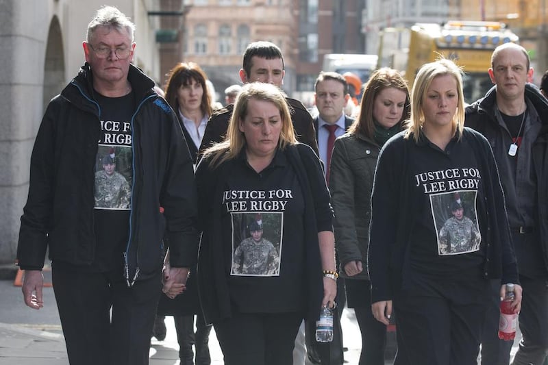 Relatives of murdered fusilier Lee Rigby — left to right — his stepfather Ian Rigby, his sister Sara McClure and his mother Lyn Rigby, arrive at the Old Bailey to attend the sentencing of Michael Adebolajo and Michael Adebowale. Oli Scarff / Getty Images