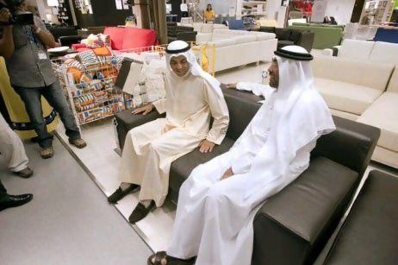 Omar Al-Futtaim, left, vice chairman of Al-Futtaim, at the new Ikea on Yas Island, with Ahmed Ali al Sayegh, chairman of Aldar Properties.