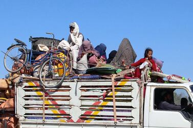 Afghans flee their villages after fighting intensified between Taliban militants and security forces in Lashkargah, the provincial capital of restive Helmand province, Afghanistan, on October 12, 2020. EPA