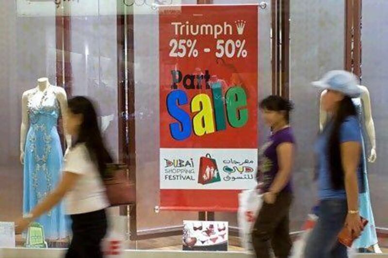 People shopping in Al Ghurair Mall during the Dubai Shopping Festival. Charles Crowell for The National