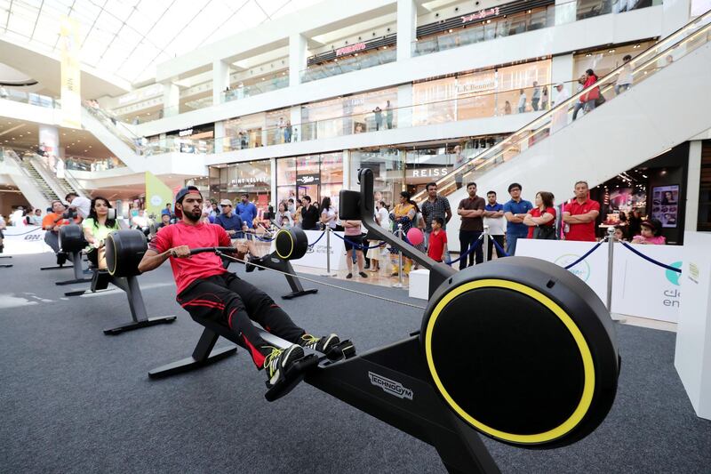 Dubai, United Arab Emirates - October 26, 2018:  Technogym take people for a rowing session at Dubai Fitness Challenge. The Crown Prince of Dubai renews his emirate-wide call for every resident to take part in 30 minutes of exercise for 30 days. Friday, October 26th, 2018 Festival City Mall, Dubai. Chris Whiteoak / The National