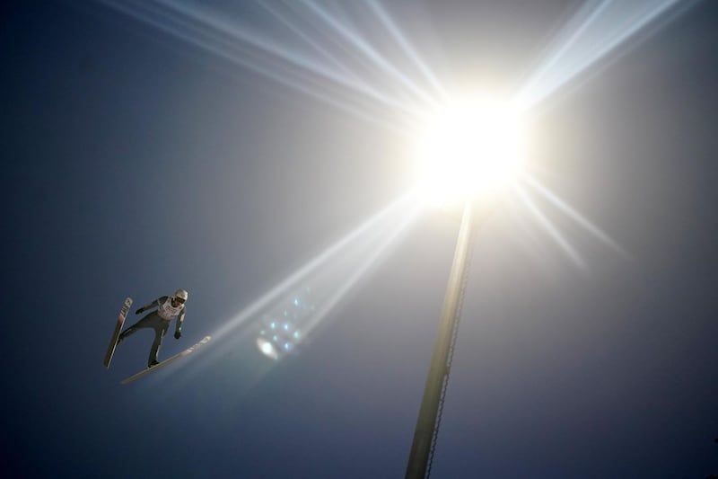 Poland's Piotr Zyla soars through the air during the first competition jump of the fourth event of the Four-Hills Ski Jumping tournament (Vierschanzentournee) in Bischofshofen, Austria. AFP