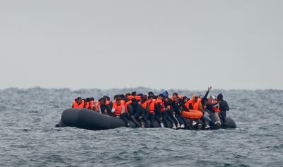 Migrants crossing the English Channel from France in a small boat. PA 