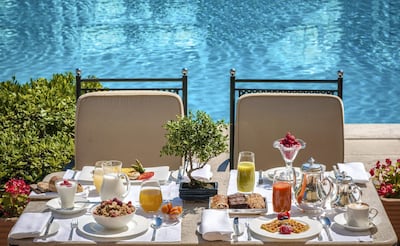 Breakfast by the pool. Courtesy Rome Cavalieri