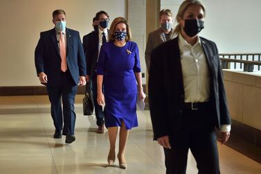 US Speaker of the House, Nancy Pelosi walks to her weekly press briefing on Capitol Hill in Washington, DC. AFP 