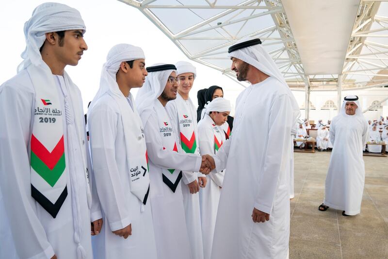 ABU DHABI, UNITED ARAB EMIRATES - December 16, 2019: HH Sheikh Mohamed bin Zayed Al Nahyan, Crown Prince of Abu Dhabi and Deputy Supreme Commander of the UAE Armed Forces (R) greets a member of 'Journey of the Union' initiative, during a Sea Palace barza.

( Mohamed Al Hammadi / Ministry of Presidential Affairs )
---