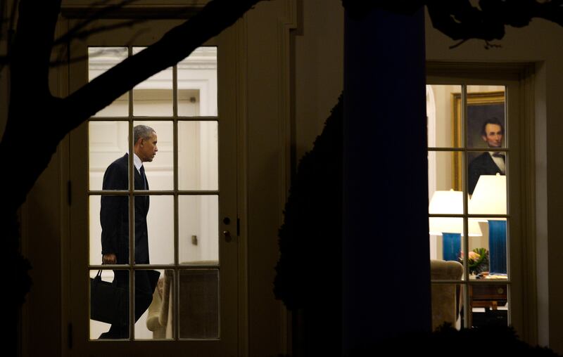 US president Barack Obama walks out of the Oval Office toward the Residence while departing the White House, on January 28, 2016, in Washington. Getty Images
