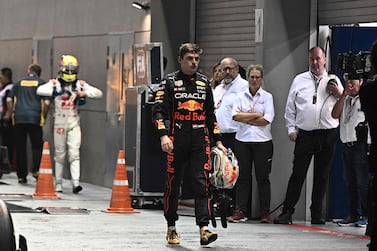 Red Bull Racing's Dutch driver Max Verstappen leaves after the Formula One Singapore Grand Prix night race at the Marina Bay Street Circuit in Singapore on October 2, 2022.  (Photo by Lillian SUWANRUMPHA  /  AFP)