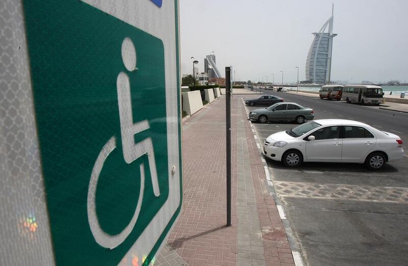 A parking space dedicated for people with disabilities in Dubai. ESG investors controlling $2.8 trillion worth of investors in the US are encouraging companies to join the Disability Equality Index, a benchmark that tracks progress toward friendlier workplaces for people with mental or physical impairments. Pawan Singh / The National