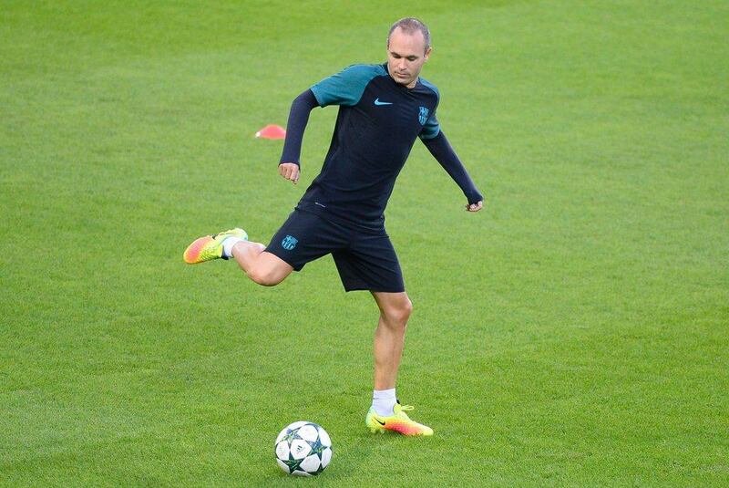 Barcelona’s Andres Iniesta attends a training session in Monchengladbach. Roberto Pfeil / AFP
