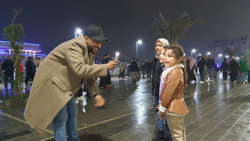 Omani journalist Salah Al Saadi recording Iraqi girls singing on Basra Corniche

